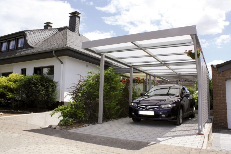 Výstavba carportu – prístrešku pre autá - na pozemku pri dome